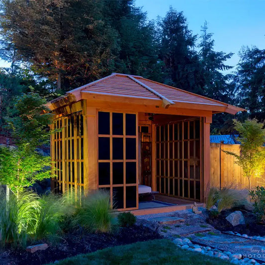 Sun Gazebo with sliding doors at dusk